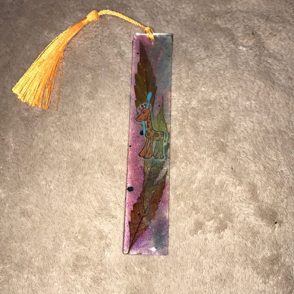 Custom Epoxy Resin bookmark Giraffe with red eyes and 3 of my favorite 🍃